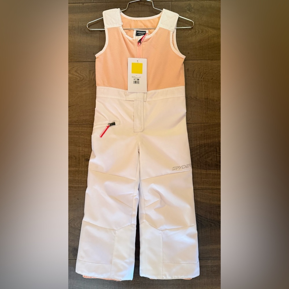 New Spyder Kids Expedition Bib Ski Pants in white with pink fleece top